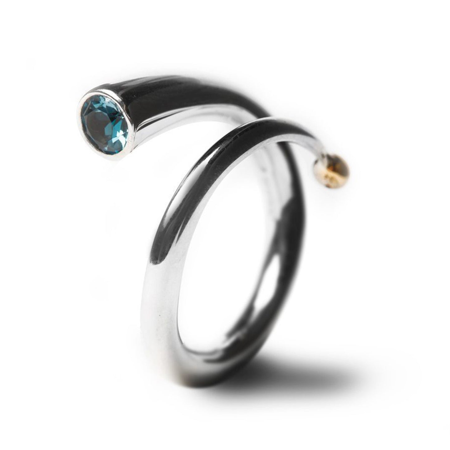 Bague Spirale argent et topaze bleue